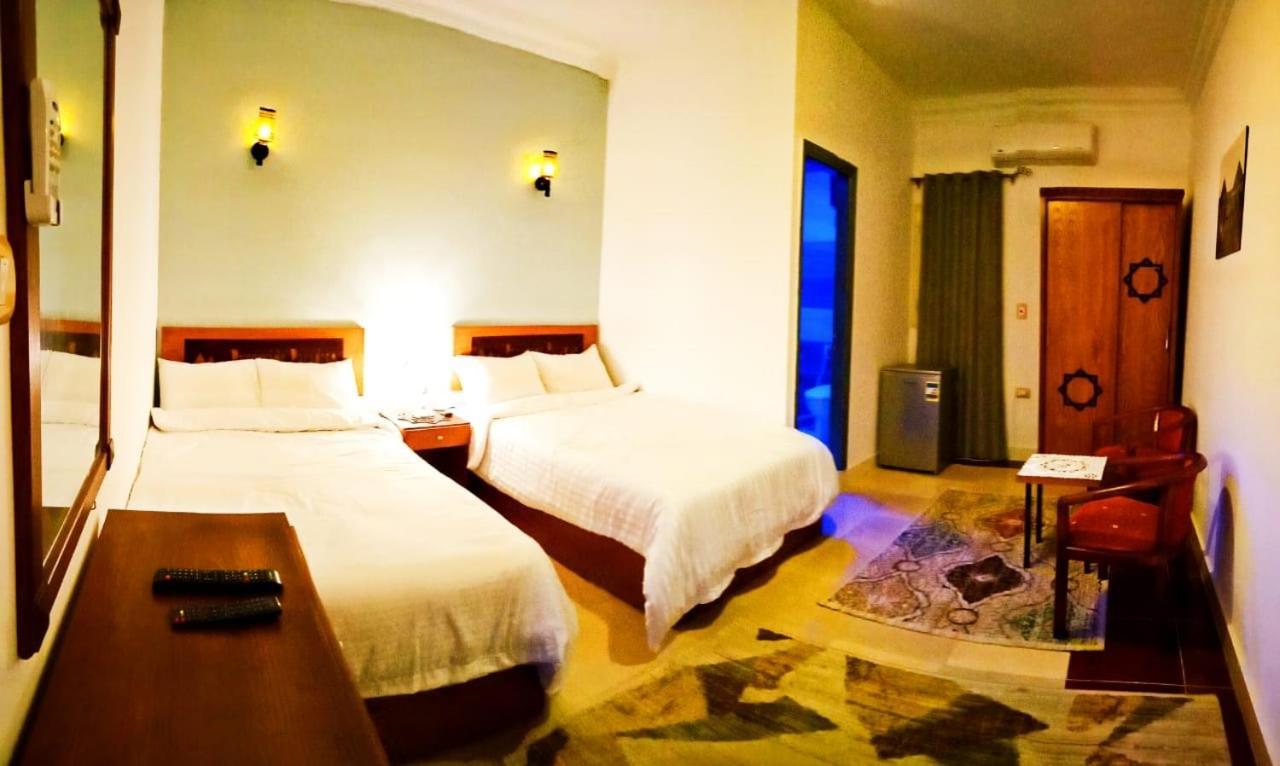 Carpet Alaadein Pyramids View Hotell Kafret el-Gabal Exteriör bild